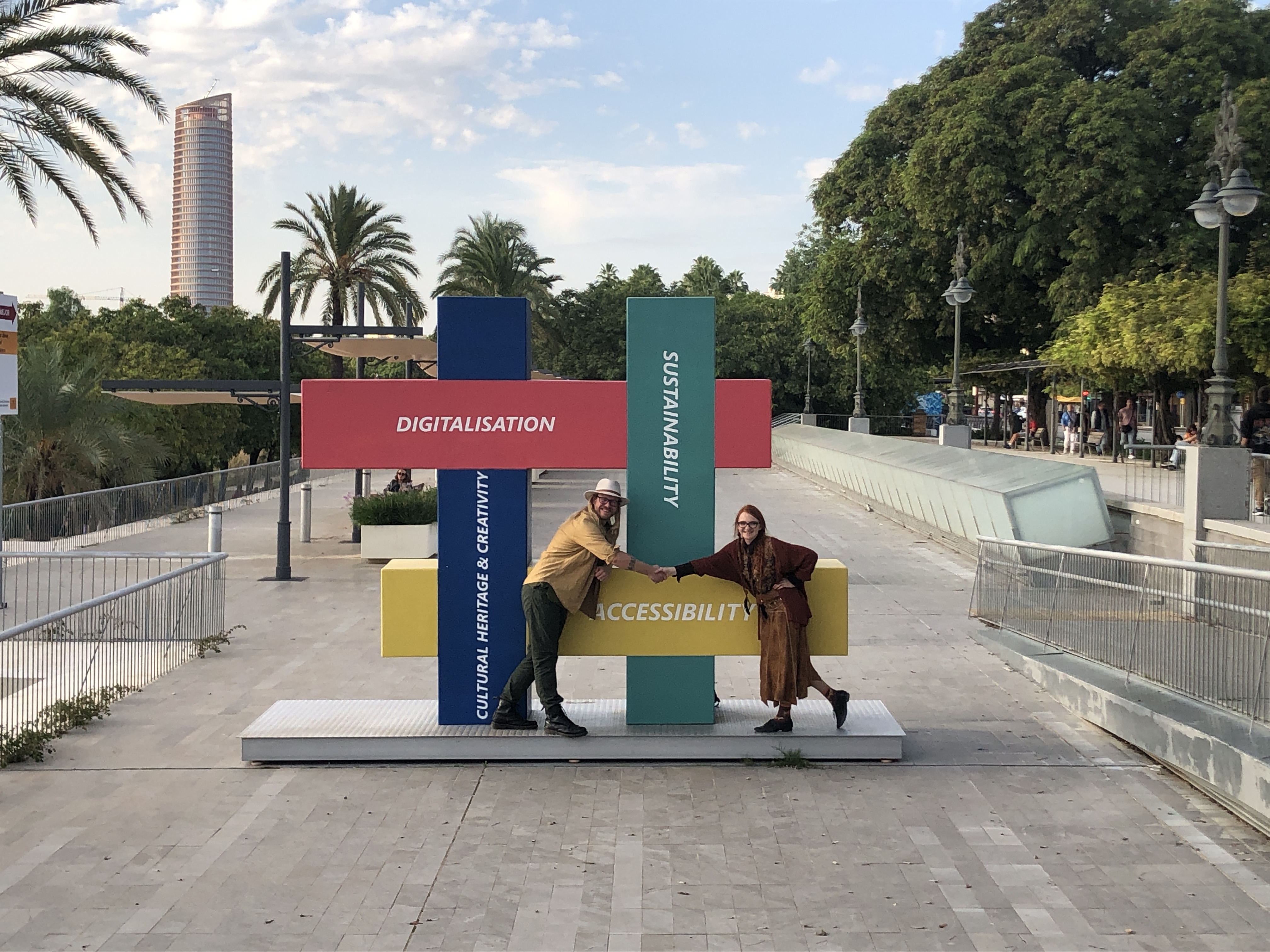 Us shaking hands in Seville